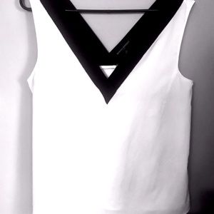 Banana Republic blouse with black trim.sleeveless